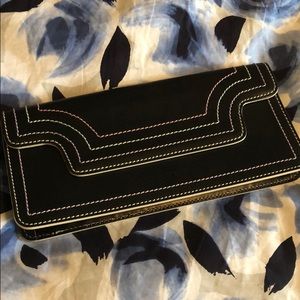 Louis Quatorze leather clutch